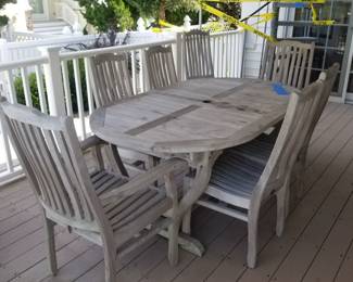 Teak dining set by Neiman Marcus