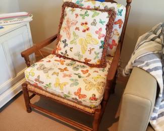 Elegant chair with butterfly upholstered pillows