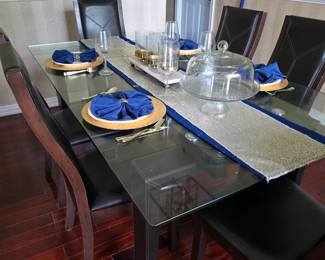 Glass table with 6 chairs