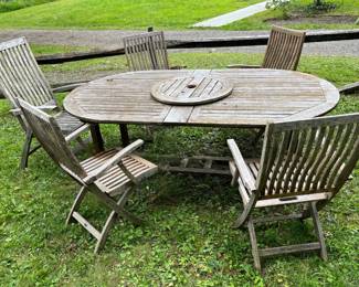Vintage Wood Outdoor Table With 4 Folding Chairs
Lot #: 119