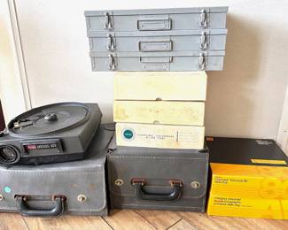 VIntage Kodak 600 Slide Projector In Case, Slide Carousels & 3 Metal Slide Storage Boxes
Lot #: 144