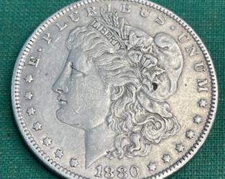 Lot # : 306z - 1880-O Morgan silver dollar
