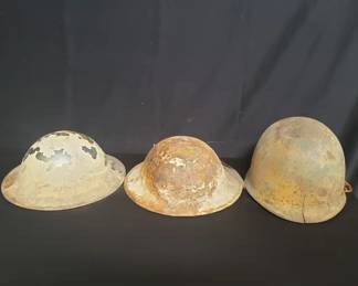 Lot # : 384 - Group of vintage military helmet movie props

