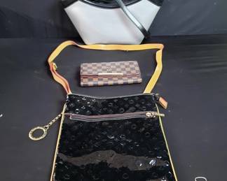 Lot # : 490 - Pair of hand bags and a wallet
