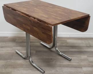 Lot # : 73 - Tubular chrome & wood drop leaf table
