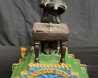 Lot # : 358 - Antique magician metal bank 

