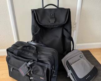 TUMI Travel Trio: Rolling Duffel, Tech Sling, & Business Bag	