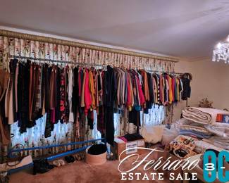 Clothing racks full of clothing. Some men's, mostly women's. Designer, casual, and everything in-between!