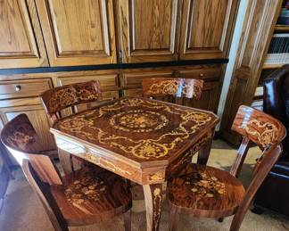 A. Cuomo & Co. Sorrento Wood Game Table with Floral Motive Inlay (complete with four matching chairs, purchased in Italy)