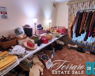 Tables full of handbags, hats, and accessories.