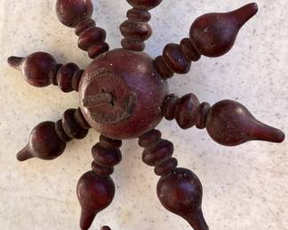 Two rare wood spindles.