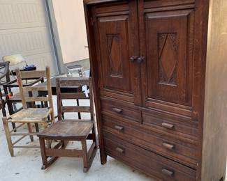 Furniture from large chest of drawers to Stickley  rocker and old ranch chair.