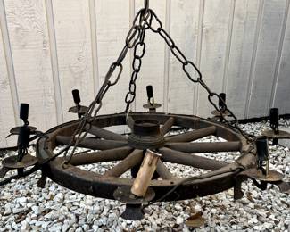Authentic wagon wheel chandelier with original cog. Fully wired, shades available. 