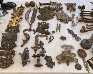Many many antique pulls and other decorative pieces from furniture.