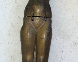 This is a metal  goddess or woman, in two pieces and broken on the base. Rare....