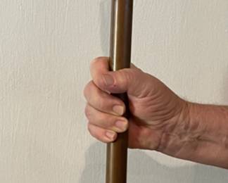 We have TWO of these very old solid brass and very heavy about 4 foot door pulls. They are hard to find and absolutely beautiful.