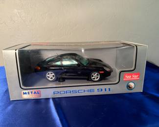 Model Porsche 911 new in box.