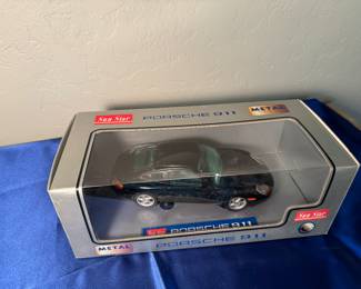 Model Porsche 911 new in box.