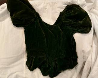 Turn of the century women's forest green bustier style top. Has whalebone stays sewn in.
