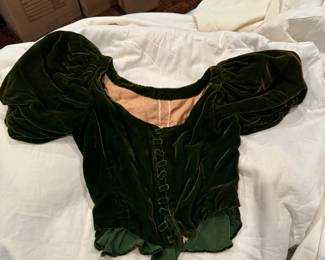 Turn of the century women's forest green bustier style top. Has whalebone stays sewn in.