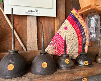 Antique oil cans