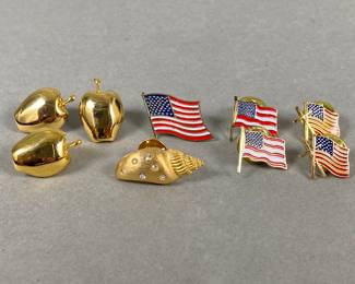 Various Lapel Pins Including: American Flags, Apples And Sea Shell