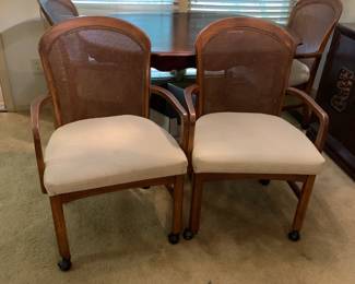 #104 4 rolling dining chairs as is 1 chair leg broken $75.00