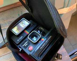 #93 Polaroid Camera in Bag $25.00