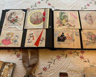 Scrap book with old greeting cards and pictures