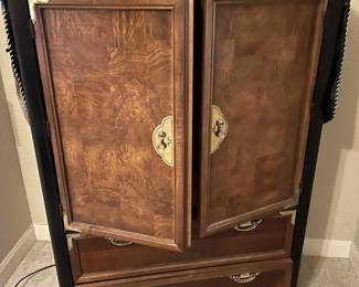 Armoire with gold accents