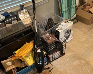 Vacuum, ironing board, sewing machine