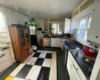 Pie safe; Tiffany-styled light fixtures