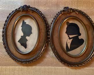 Pair of silhouettes, framed