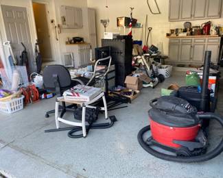 hampers, rug, brooms, eureka envirosteamer, ladders, oreck xl vacuum, eureka the boss, shovel, extension cords, ceramic planters, delta shopmaster saw, camping chairs, Halloween decorations, leaf hog leaf blower, waste baskets, manual resuscitator, craftsman wet dry vac, scrap books, biotab healthcare compression therapy machine, small Roku smart tv, office chair, outdoor side table, microphone, garage parking sensor, windshield scraper, air compressor, ilumi flood smartbulb, kodak instamatic m65, baseball gloves, projector slide holder, wall decor, craftsman tool cabinet, sentinel shredder, coleman mini latern radio, lawn decor, ultrasonic cleaner, clothing rack, winix plasmawave, health o meter scale, table cloth, food saver vacuum sealer, oreck iron, mops, swiffer, soap, soap holder, crutches, bissell bolt plus, phillips hue, antique medication bottles, shaving accessories, Cadillac Trunk Cargo Bag. Pelican 1470 Case, 