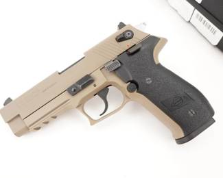 Make: GSG
Model: Firefly
Caliber: .22LR
Action: Semi
Barrel: 4
Bore: Shiny
Serial # F600697
Condition: Excellent
Importer: American Tactical
Country: Pistol
The American Tactical Inc. GSG Firefly Rimfire Semi-Auto Pistol with Threaded Barrel is a scaled-down version of a classic P-series SIG, chambered in 22LR. This model features a threaded barrel for shooting suppressed. There's a slide-mounted thumb safety and a right-handed functional decocker. The DA/SA trigger makes for a nice training pistol utilizing cheaper rimfire ammunition. The aluminum alloy frame is very durable. The Firefly's frame has an integral Picatinny accessory rail and features polymer grip panels. The pistol is sold with its factory case and is in very good condition, showing minimal signs of use and wear.