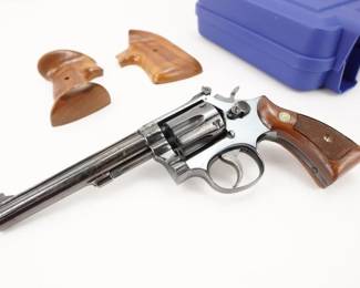 Make: Smith & Wesson
Model: 17-3
Caliber: .22 LR
Action: DA
Barrel: 5.75
Bore: Shiny
Serial # K937437
Condition: Good
The Smith & Wesson K-22 Target Masterpiece Revolver (Model 17) is a six-shot, double-action revolver with adjustable open sights, built on the medium-size "K" frame. Sold with extra grips and the factory case, this double action revolver is in very good condition, showing normal signs of use and wear. 