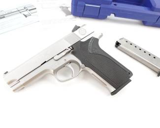 Make: Smith & Wesson
Model: 4586 3rd Gen
Caliber: 45 Auto
Action: Semi
Barrel: 4
Bore: Shiny
Serial # TZH7186
Condition: Great
Only manufactured for a couple of years. This Smith and Wesson 4586 Third Generation single-stack pistol is similar to model 4566, but double-action only with a bobbed hammer.Chambered in 45 Auto and features a 4” barrel. These Pistols are quite Rare since these were marketed to police and law-enforcement and not the general public.This pistol is sold with 2 mags and factory box. This Pistol remains in Great condition showing normal signs of use and wear.