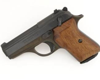 Make: FIE
Model: E380-SSP
Caliber: .380 AUTO
Action: Semi
Barrel: 3.3
Bore: Shiny
Serial # P4689
Condition: Very Good
The FIE E380-SSP is an American made single action semi-automatic compact pistol chambered in .380 Auto. Features a blued slide, 3.3” fixed barrel with integral sighting rib & blade front sight, dovetail rear sight with square notch, serrated round trigger, serrated round hammer spur, manual safety on the left side of the frame, manual safety on the left side of the slide, and heel magazine release. The pistol is sold with one magazine and is in very good condition, showing normal signs of use and wear.