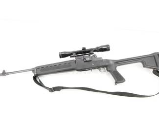 Make: Ruger
Model: Mini-14
Caliber: 223
Action: Semi
Barrel: 21
Bore: Shiny
Serial # 161-20876
Condition: Very Good
The Mini-14 is a lightweight semi-automatic rifle manufactured by Sturm, Ruger & Co. Introduced in 1973, the design was outwardly based on the M14 rifle and is, in appearance, a scaled-down version chambered in 5.56×45mm NATO, though with its own gas system design. The rifle is sold with a Tasco scope and sling but with no magazine.