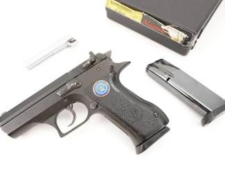 Make: IMI
Model: Desert Eagle Pistol
Caliber: .45 ACP
Action: Semi
Barrel: 3.75
Bore: Shiny
Serial # 31302208
Condition: Very Good
Importer: Magnum Research
Country: Pistol
Introduced in the 1990s and Manufactured in Israel (IMI), This pistol is marketed in the United States as the Baby Desert Eagle. The Baby Desert Eagle is based upon the CZ 75 design. This particular model is chambered in .45 ACP and features a 37..5” barrel. This pistol also shows a Department of defense badge on both grips. This pistol is sold with a factory Case, two mags and additional barrel. This pistol remains in Very good condition showing normal signs of use and wear. 