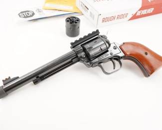 Make: Heritage
Model: Rough Rider
Caliber: .22 MAG
Action: SA
Barrel: 6.5
Bore: Bright
Serial # G64927
Condition: Excellent
For making tin cans dance in the backyard, pinging steel, or controlling pests and varmints around the farm, nothing beats the low-cost, high-adrenaline thrill of a single-action rimfire revolver. Chambered in 22 LR, is also compatible with the 22WMR cylinder allowing you to shoot either 22 LR or 22 WMR ammo. The new Heritage Rough Rider Tactical Cowboy features modern day technology into an old classic world. The barrel is threaded for accessories like compensators and suppressors. The picatinny rail allows the user to add different optics if desired, but also works as a rear open sight to be used with the bright front fiber optic sight. This revolver is sold with additional cylinder and factory box. This revolver is in Excellent condition showing little signs of use and wear.