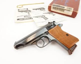 Make: Walther
Model: PP
Caliber: 7.65mm
Action: Semi
Barrel: 3.75
Bore: Bright
Serial # 321050
Condition: Great
Importer: Interarms
Country: Pistol
In 1952, Walther licensed production of the PP series pistols to a French company, Manufacture de Machines du Haut-Rhin, also known as Manurhin.Left Side of the Slide is Marked Manufacture de machines DU HAUT-RHIN MANURHIN, made in France, Manurhin LIC. EXCL WALTHER, MOD.PP Cal.7.65mm. This Pistol shows an import mark Interarms, Alex,. VA. Proof stamps throughout. The PP (Polizeipistole or police pistol) model is a blowback design so the barrel is fixed to the frame. The PP sports an exposed hammer and classic double-action / single-action operation.This pistol is sold with, checkered wood grips, original mag, its Factory box and paperwork. This Pistol remains in Great condition showing normal signs of use and wear.