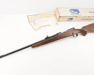 Make: Winchester
Model: 70 XTR
Caliber: 338 WIN. MAG
Action: Bolt
Barrel: 24
Bore: Shiny
Serial # AK136
Condition: Excellent
A Great addition to any model 70 Collector. This 25TH Anniversary Alaskan Statehood Commemorative was a Limited run 0f 500 produced in 1984. Chambered for the powerful .338 Winchester Magnum, it wears a 24" barrel with iron sights. It features silver engraving on each side of the receiver, a special silver filled "Alaskan 25th Anniversary" rolling marking on the right side of the barrel, and a silver engraved standing Brown bear beneath "ALASKAN STATEHOOD 1959-1984" on the magazine floor plate. The special serial number is AK146. It comes in the original box which numbers to the gun and includes the owner's manual and miscellaneous factory paperwork. This Rifle Remains in Excellent condition showing little signs of use.