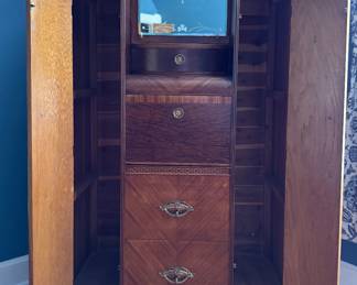 Art Deco Waterfall Chifferobe / Drop Down Secretary. Circa 1930s. Mahogany, Walnut Burl and Satinwood Banding. Has Two Cedar Lined Cabinets. Measures 40" W x 20" D x 70" H. Photo 6 of 8.