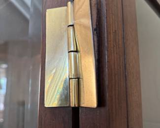 Pair of Vintage Henredon Campaign Chests Each with Removable Campaign-Style Vitrine. Each Cabinet Measures 32" W x 18" D x 28" H. Each Vitrine Measures 32" W x 14" D x 52" H. One Cabinet Has Wonky Hinge. Photo 5 of 6.