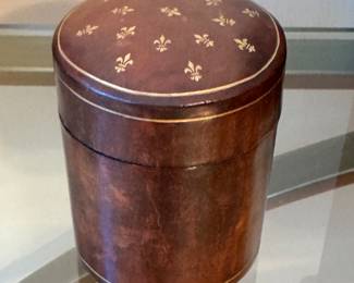 Round Florentine Mid Century Leather Boxe with Fleur-De-Lis Decoration.