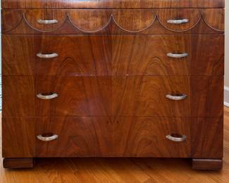 1940s Joerns Brothers Art Deco Waterfall Four-Drawer Lowboy Dresser with "Scallop" Trim. Measures 48" x 22" x 36".