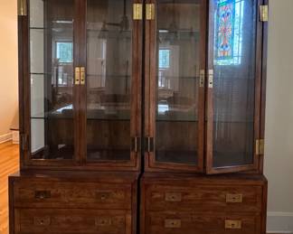 Pair of Vintage Henredon Campaign Chests Each with Removable Campaign-Style Vitrine. Each Cabinet Measures 32" W x 18" D x 28" H. Each Vitrine Measures 32" W x 14" D x 52" H. One Cabinet Has Wonky Hinge. Photo 1 of 6.