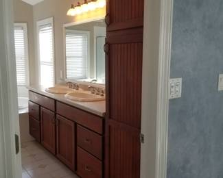 Handsome wood double bath vanity with storage tower
