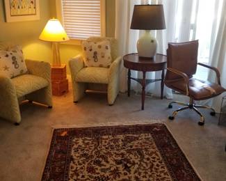 Bernhardt end tables; matching table lamps; upholstered swivel chairs; elegant area rug
